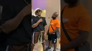 chike daniels having a laugh backstage with colleagues