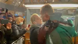 Alexei Navalny detained at airport on return to Russia