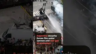 Argentinian security forces fire water cannon and tear gas at labour reform protesters