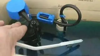 adjusting the Fluidmaster 400AH toilet fill valve on the AquaSource toilet