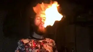 Flow Artist Shows Fire Eating Tricks With Two Lit Torches