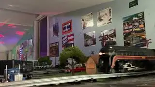 MTH Norfolk and Western imperial J class with Lionel warhorse hoppers on layout 