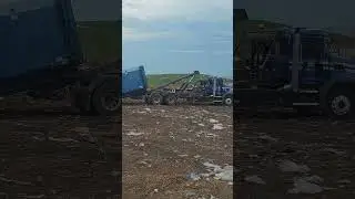 Rolloff Loading A  Compactor