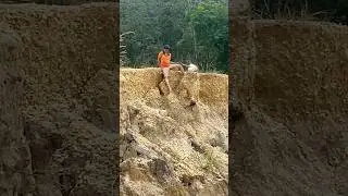The reckless action of a gold hunter at the location of a gold mine..