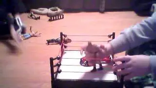 sammy playing with wwe figures