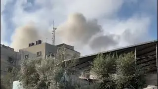 Smoke billows after Israeli strike near Indonesian hospital in Gaza | AFP