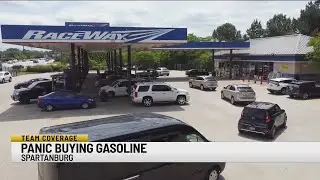 Customers panic buy gasoline