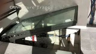 Trappe de cave vitr&eacute;e et motoris&eacute;e