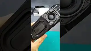 Dual 1.5-inch speakers from the projector