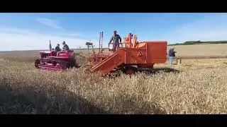 Allis Chalmers All Crop 60 and International 62 trailed combines.