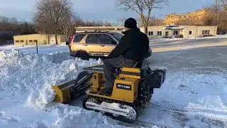 Snow Problem? See the MAGNATRAC&reg; Minidozer Working in Action!