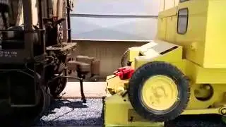 Refurbished 75 TM Trackmobile coupling to railcars on www.railmover.com