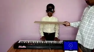 Fastest To Play Indian National Anthem On Piano Blindfolded By A Teenager