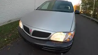 Обзор Pontiac Montana Cargo 2004 года с опущенным полом, виртуальный тест-драйв и осмотр автомоби...