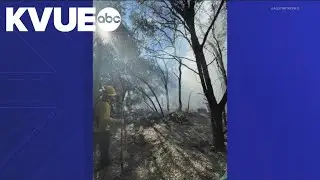 Crews battle large fire at South Austin encampment near greenbelt Saturday afternoon