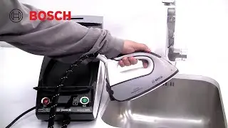 How do I refill my steam station with water?