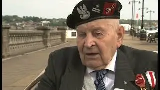 Colonel Otton Hulacki speaking to Kasia Madera on the 75th anniversary of Błyskawica's WW2 defence