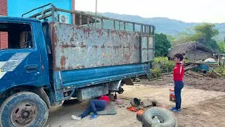 The talented girl restored the truck and repaired these rusty wheels.