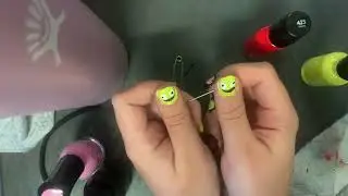 painting smiling friends on my nails horribly