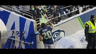 Seahawks Giving Gear to Kids after the Bears game.