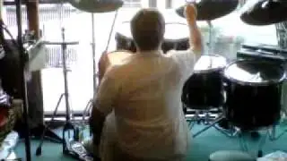 JB Plays Drums in Store Window