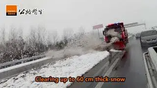 Snow Plow on Patching Vehicle