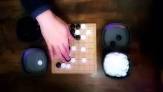 Przykładowa gra w GO 9x9