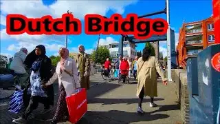 Watching Dutch ships between two bridges. Dutch relaxation and lots of bicycles.