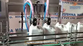 AUTOMATIC 2 HEAD SERVO LIQUID FILLING MACHINE FOR 2 LTR TO 10 LTR JARS