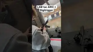 LawTactical ARIC shooting folded with Digitrigger