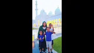 African Family explores Sheikh Zayed Grand Mosque Centre in Abu Dhabi by public transport from Dubai