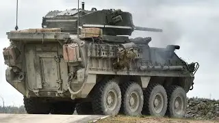 Солдаты Армии США и бронемашины Stryker ICV-D с 30 мм пушкой на учениях в Германии.