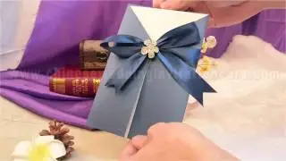 dark blue wedding invitation card with blue ribbon with rhinestone