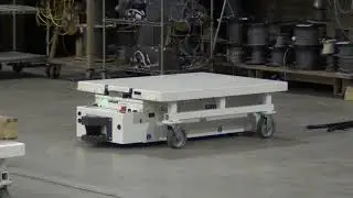 SAVANT 'Tape/Target-free' AGV with Floor Level Cart Positioning