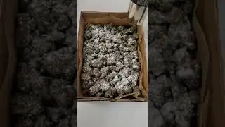 Hemp flower, covered in frozen delta 8 distillate that was crushed into powder.