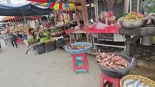The local market in, phnom Penh Cambodia, eggs, animal intestines, pork ears, feet, heads, chicken