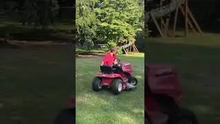 Dwarf driving lawnmower