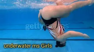 women swimming underwater women swimming outdoor pool