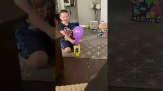 Balloon rocket Using Balloon Zoom, dad and Isiaha