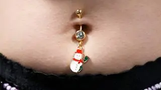 This snowman belly ring is the PERFECT winter jewelry