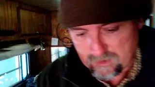 Off Grid Camper in the Woods Fire and Solar Powered Energy Sources