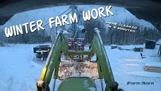 Clearing Farm Yards After Snowfall With the Tractor