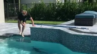 Catching a wild Alligator in a pool underwater with my hands