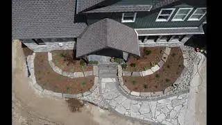 Armour stone raised flowerbeds