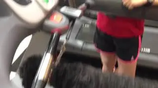 Justin on treadmill with trainer