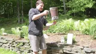 How to light a charcoal chimney with paper towel and vegetable oil.