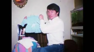 my nana Doyle with kim the dog & my dad just before my sis was born