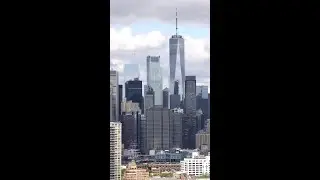 Planes, One WTC, and more of the New York City skyline from a Brooklyn window with busy city sounds