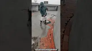 Leveling wet concrete surface with manual precision worktool screed bar