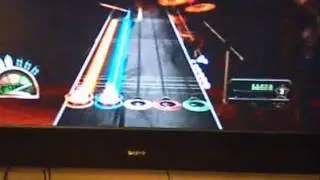 Devren Playing Guitar Hero